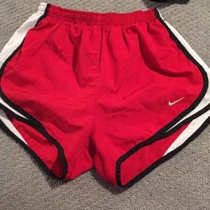 red nike shorts